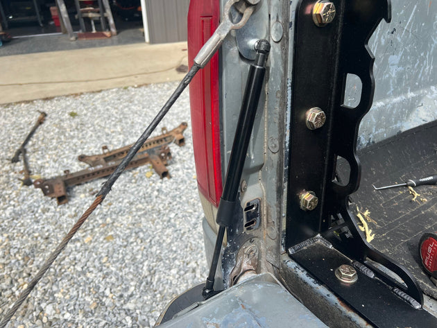 OBS 87-96 Ford F-Series Tailgate Assist Bracket JC Customs, black metal bracket installed on tailgate