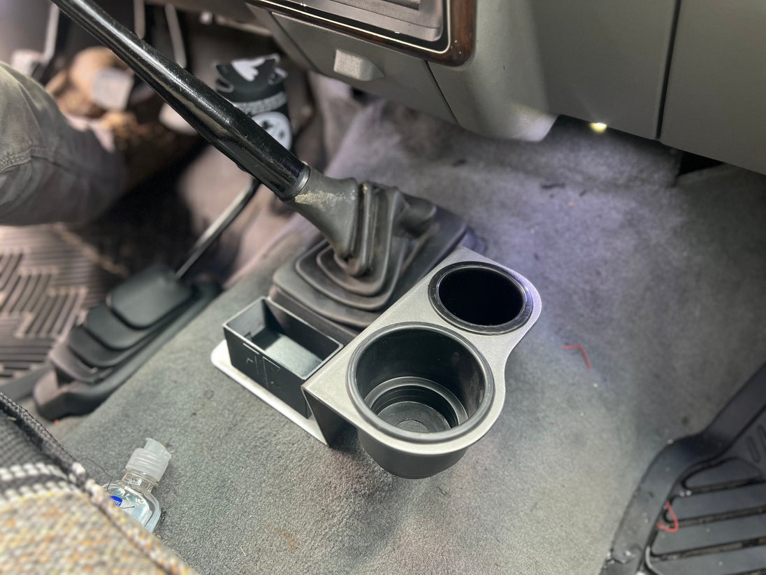 JC Customs OBS Ford F-Series Shifter Mounted Cup Holder black plastic center-console cup holder module beside gear shifter