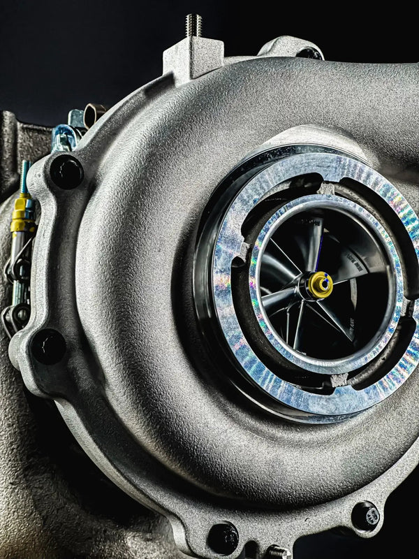 DURAMAX LLY-LMM TTS GEN2 66/67 Turbocharger Titan Turbo Service; silver cast housing with rainbow-edged compressor wheel