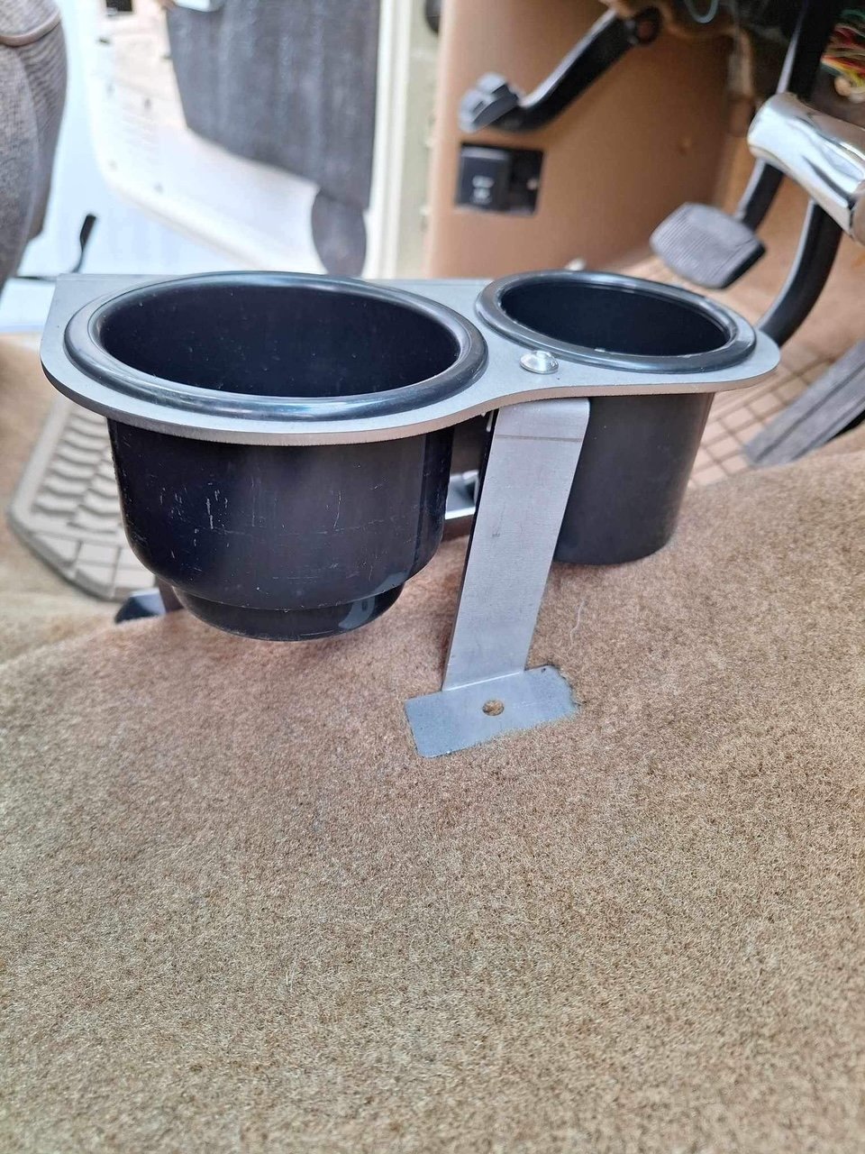 Ford F-Series auto shifter mounted cup holder, dual black plastic cups on gray metal bracket, JC Customs