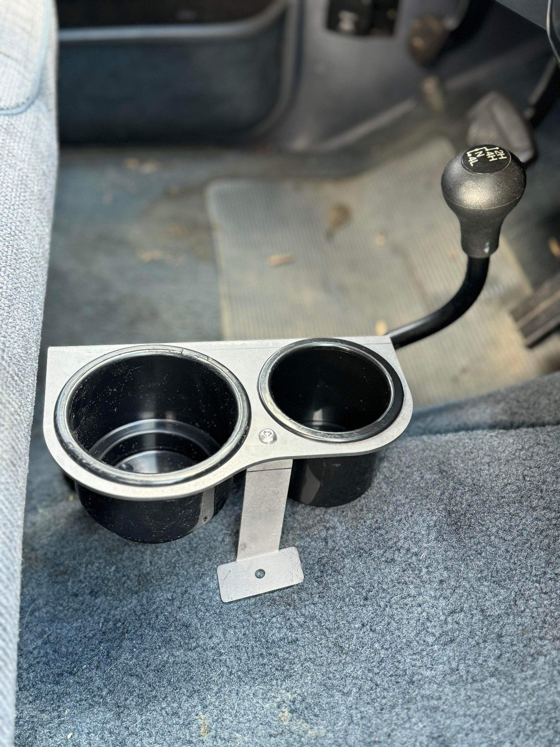 JC Customs Ford F-Series auto shifter mounted cup holder with dual black plastic cups and metal bracket