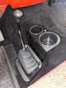 Ford F-Series Auto Shifter-Mounted Cup Holder JC Customs, black plastic center console with dual cup openings