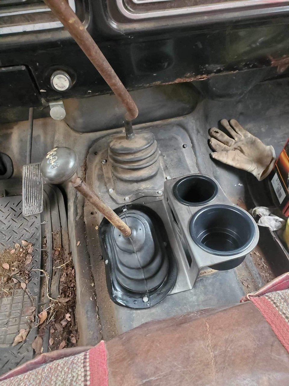 JC Customs OBS Ford F-Series shifter-mounted cup holder, dual black cup openings beside the gear shifter