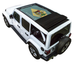SpiderWebShade sun shade for Jeep Wrangler JLU Sky One Touch Power Top; black stock printed shade top on white Jeep