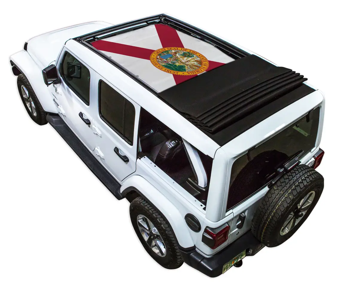 Sun shade SpiderWebShade for Jeep Wrangler JLU; Florida flag-printed shade top on white SUV