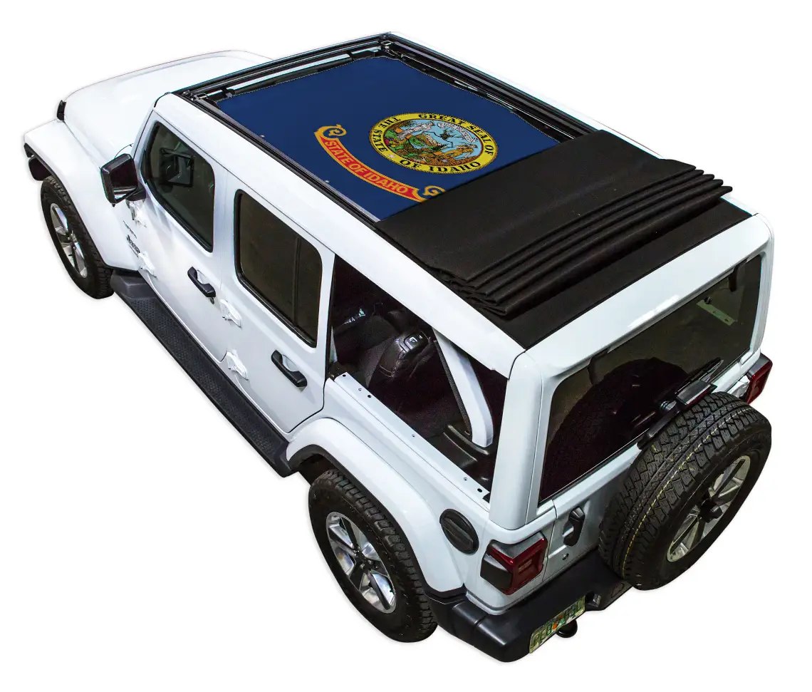 SPIDERWEBSHADE Sun Shade for Jeep Wrangler JLU Sky One Touch Power Top; blue printed shade top on white Wrangler.