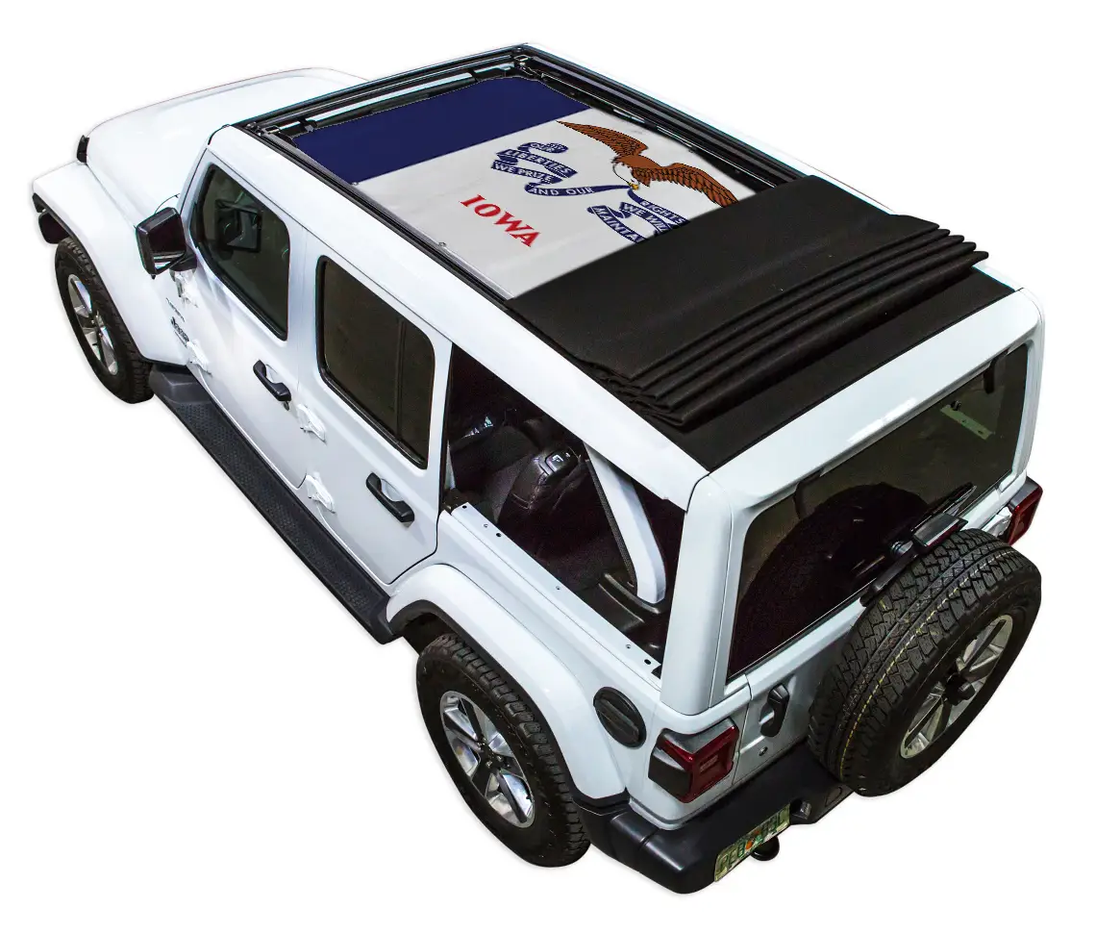 SpiderWebShade sunshade top for Jeep Wrangler JLU Sky One Touch Power Top on a white Jeep Wrangler