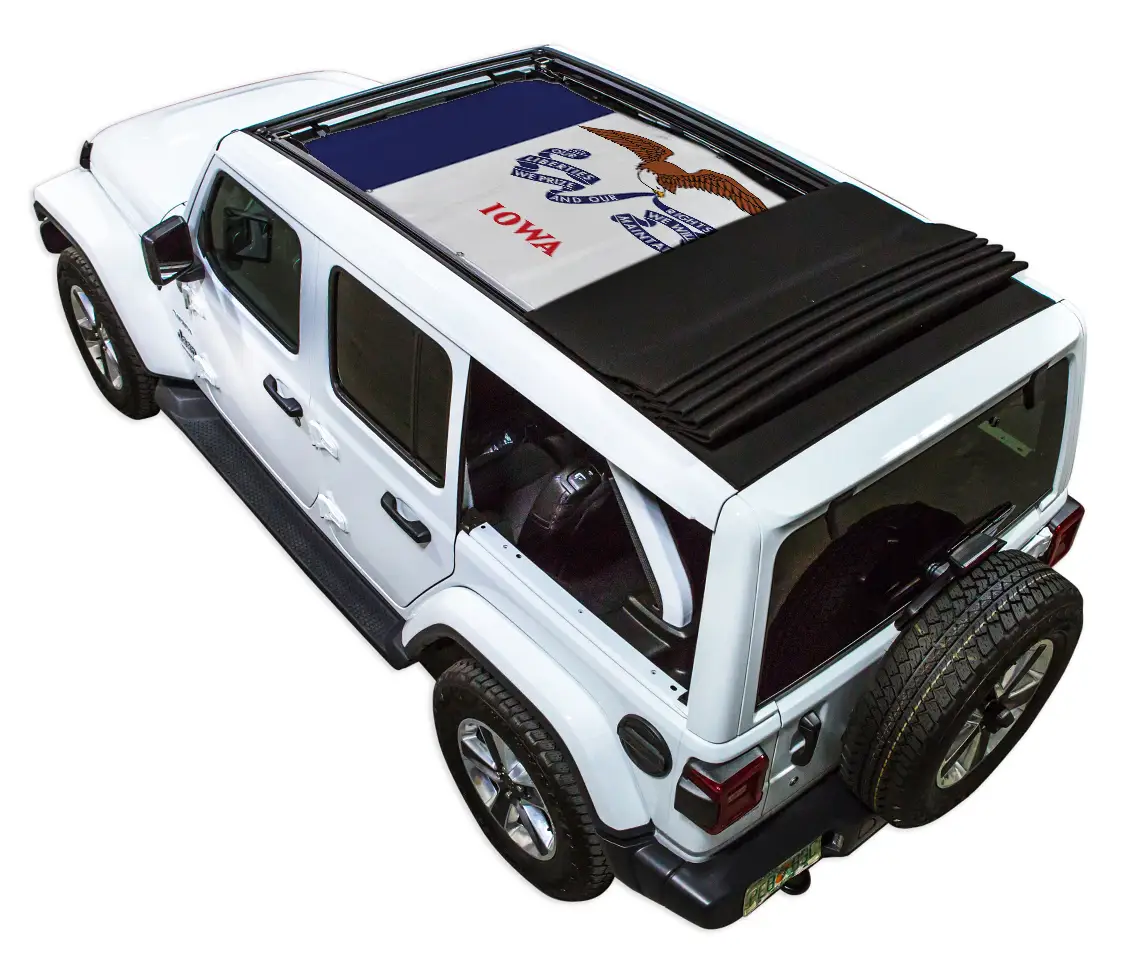 SpiderWebShade sunshade top for Jeep Wrangler JLU Sky One Touch Power Top on a white Jeep Wrangler
