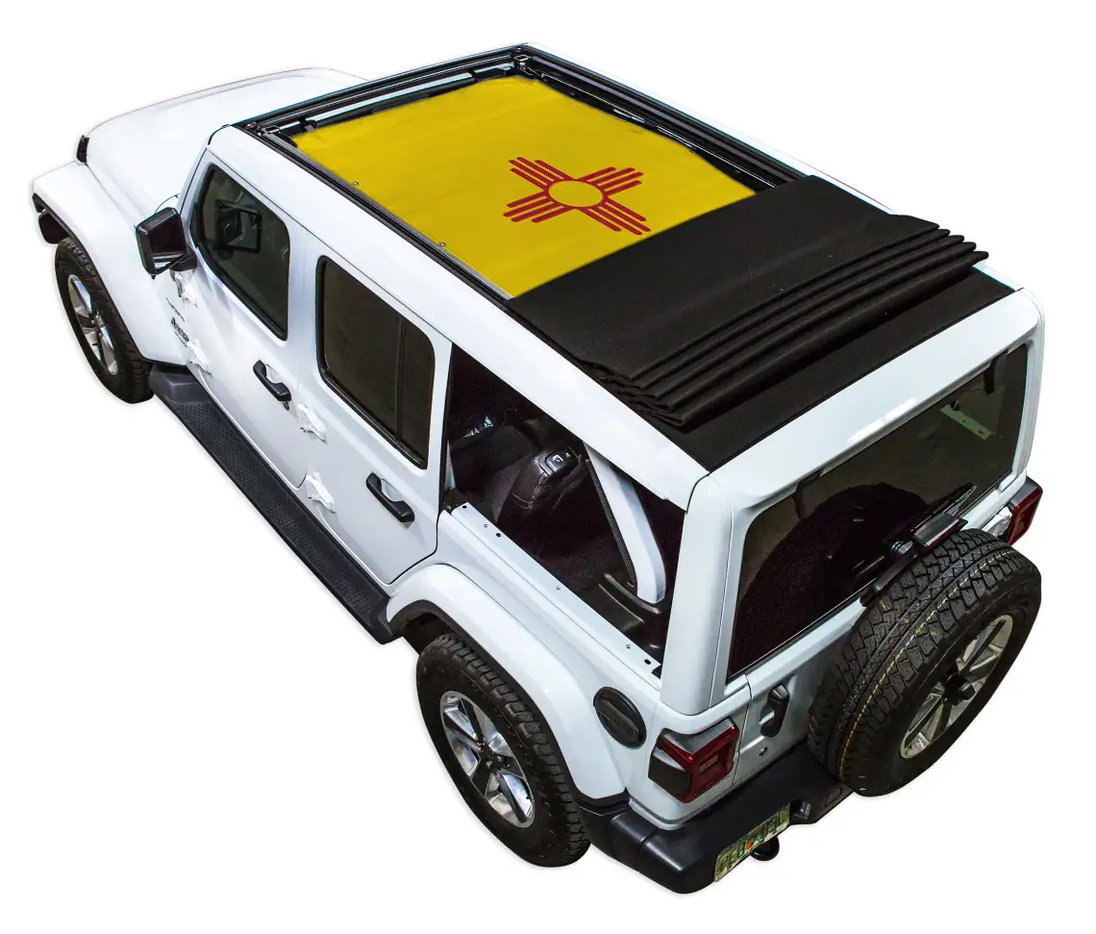 Sun shade for Jeep Wrangler JLU by SPIDERWEBSHADE; yellow stock-printed shade on white Jeep with rolled-back black top