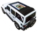 Sun shade top for Jeep Wrangler JLU by SpiderWebShade, black stock printed shade with flag graphic
