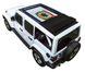 Sun shade top for Jeep Wrangler JLU by SpiderWebShade, black stock printed shade with flag graphic