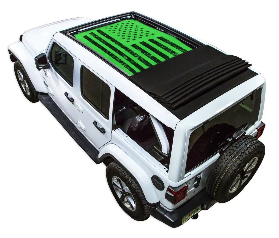 Sun shade top for Jeep Wrangler JLU by SpiderWebShade, green printed stock shade with flag motif on a white 2018–2026 Wrangler.
