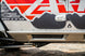 Artec JT Aluminum Rocker Armor mounted to side rocker panel of off-road vehicle; silver aluminum shield with bolts.
