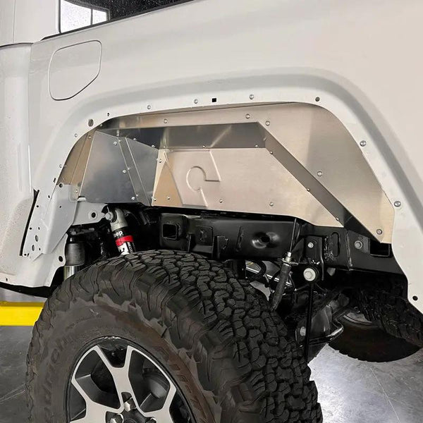 Artec JT Gladiator rear inner fenders, silver metal panels with riveted construction