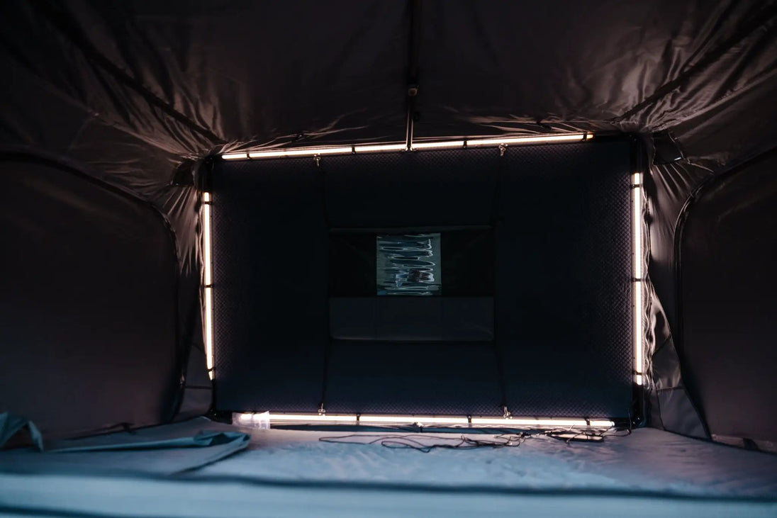 Aluminum PO Pup Roof Top Tent by Smittybilt interior with side-opening RTT and LED lighting