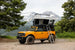 Aluminum PO Pup Roof Top Tent by Smittybilt atop a yellow Bronco, gray RTT with ladder.
