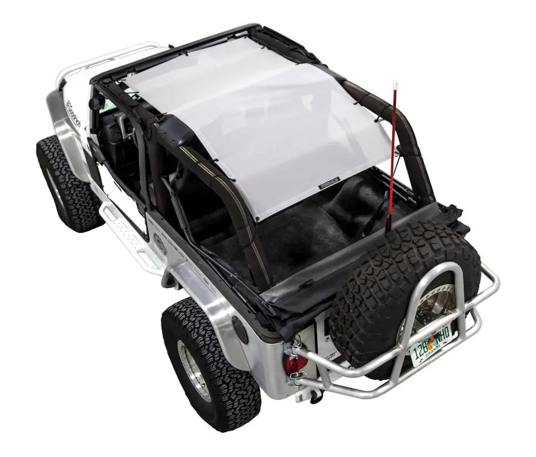 Sun Shade top for Jeep Wrangler LJ (2004–2006) by SpiderWebShade, translucent white shade over roll bars.