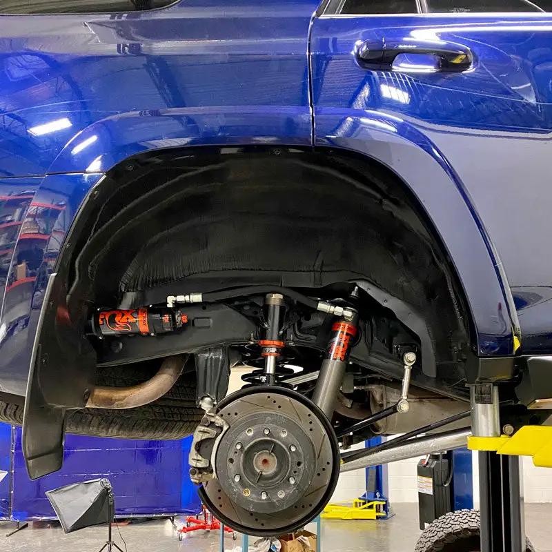 4Runner 5G Aluminum Rear Link Kit with Track Bar on blue Toyota rear suspension