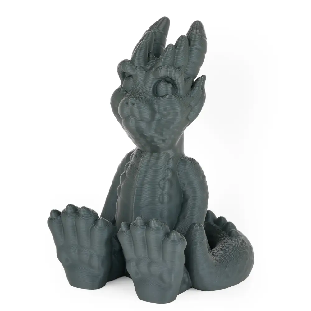 PLA+ 3D printed dragon figurine in dark gray, compact statue with raised front paws.