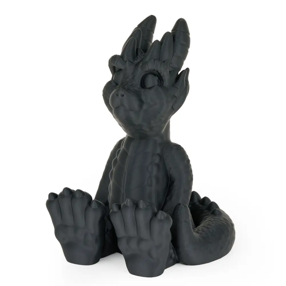 PLA Matte dragon figurine by Numakers; matte black 3D-printed filament accessory