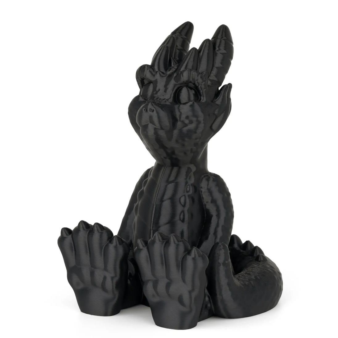 3D-printed black hand sculpture using Numakers Silk PLA