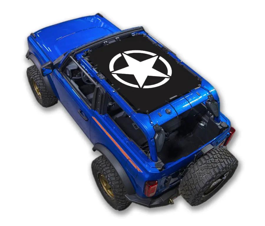 Sun Shade Top for Ford Bronco (2021–2026) by SpiderWebShade; blue Bronco with black shade featuring white star logo.