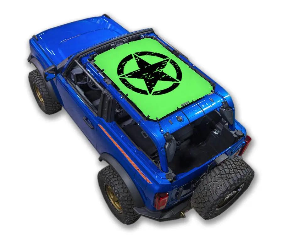 Ford Bronco sun shade by SPIDERWEBSHADE; lime green stock print with black star emblem