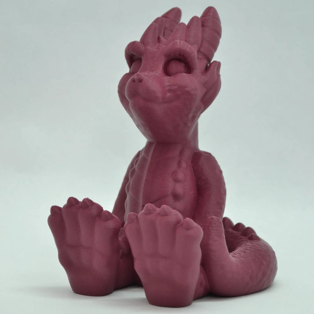 PLA-CF 3D printer accessory Numakers maroon hand sculpture