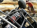 Artec Quart Crate - 4 Banger Aluminum accessory on off-road buggy frame amid rocky terrain