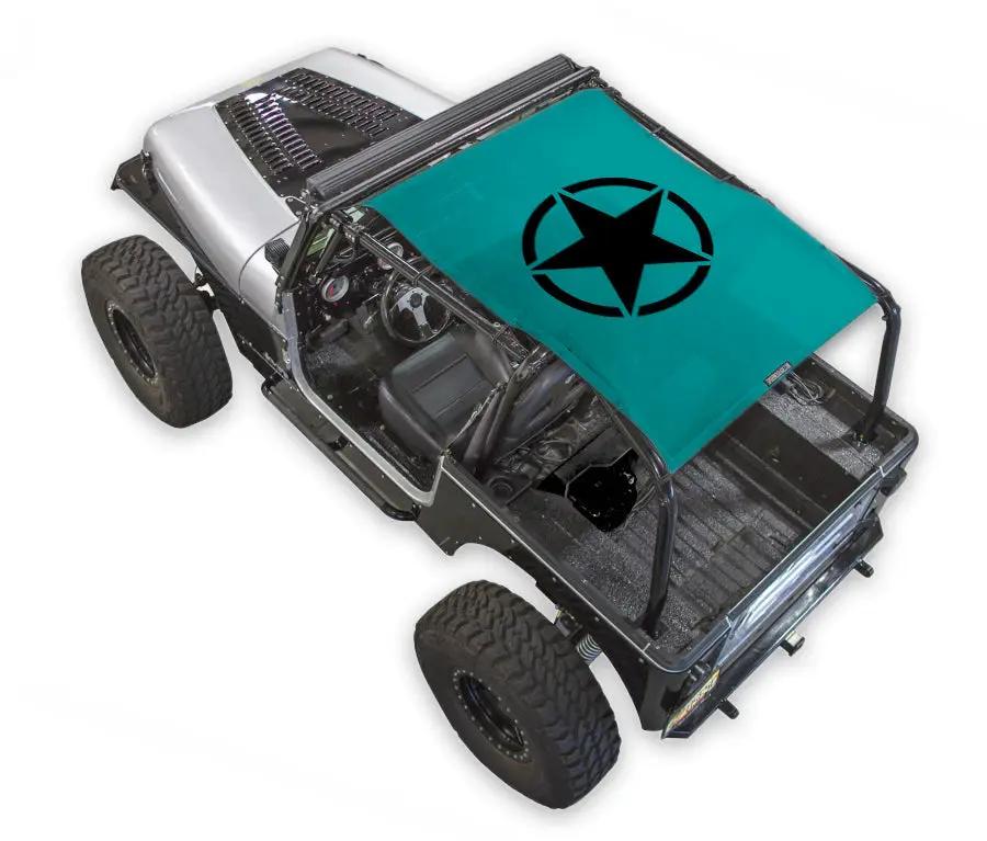 Sun shade by SPIDERWEBSHADE for Jeep Wrangler YJ (1987–1996); teal printed shade top with black star logo.