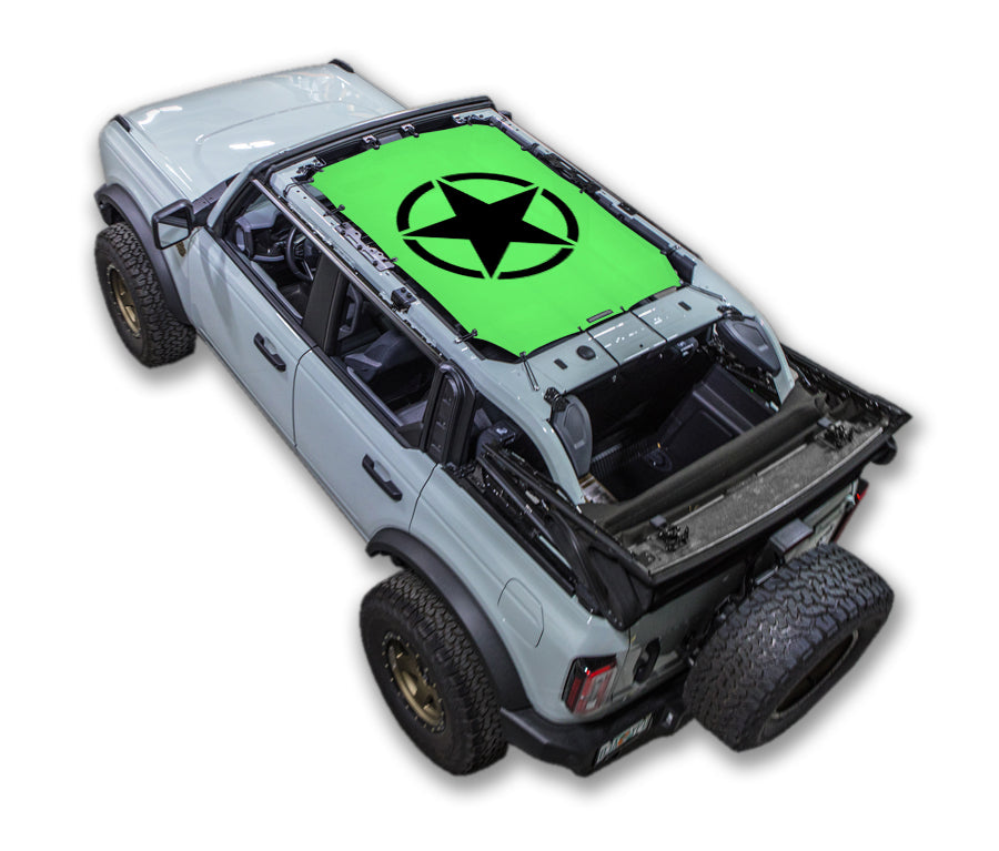Ford Bronco sun shade top (2021–2026) by SPIDERWEBSHADE; bright green printed shade with black star logo.