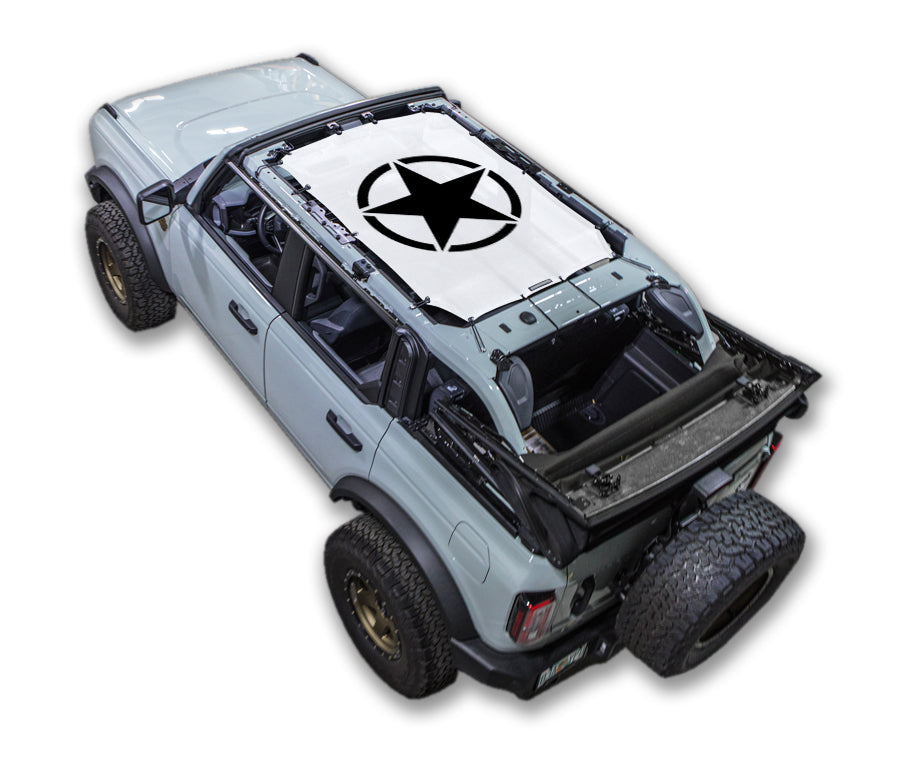 Sun shade top for Ford Bronco (2021–2026) by SPIDERWEBSHADE with white fabric and black star logo.