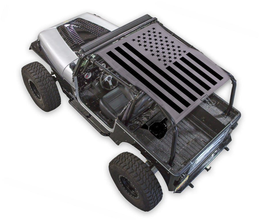 Sun shade by SPIDERWEBSHADE for Jeep Wrangler YJ (1987–1996) with black American flag print.