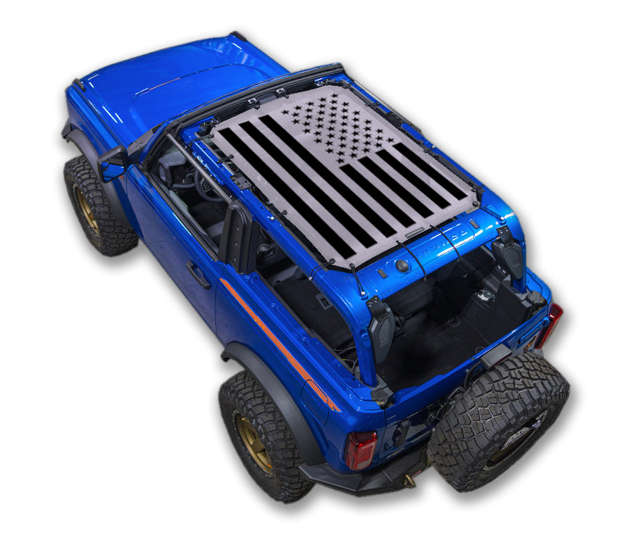 Ford Bronco sun shade top by SPIDERWEBSHADE with US flag print on blue vehicle