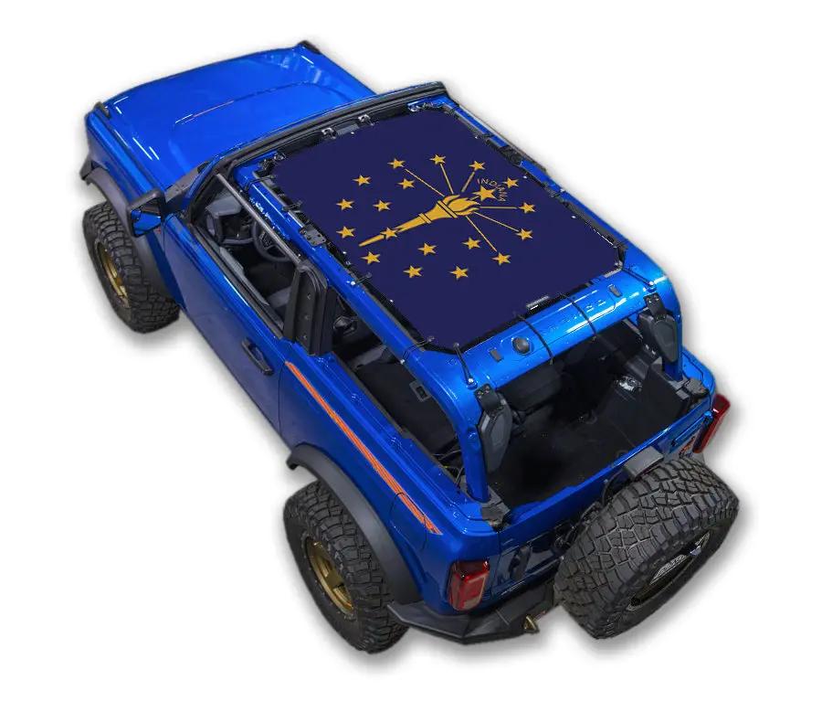 Sun shade top for Ford Bronco by SpiderWebShade; blue printed roof with Indiana state flag design