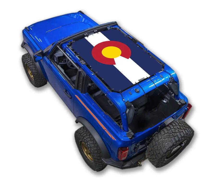 SpiderWebShade sun shade top for Ford Bronco (2021–2026), blue SUV with Colorado flag print on roof