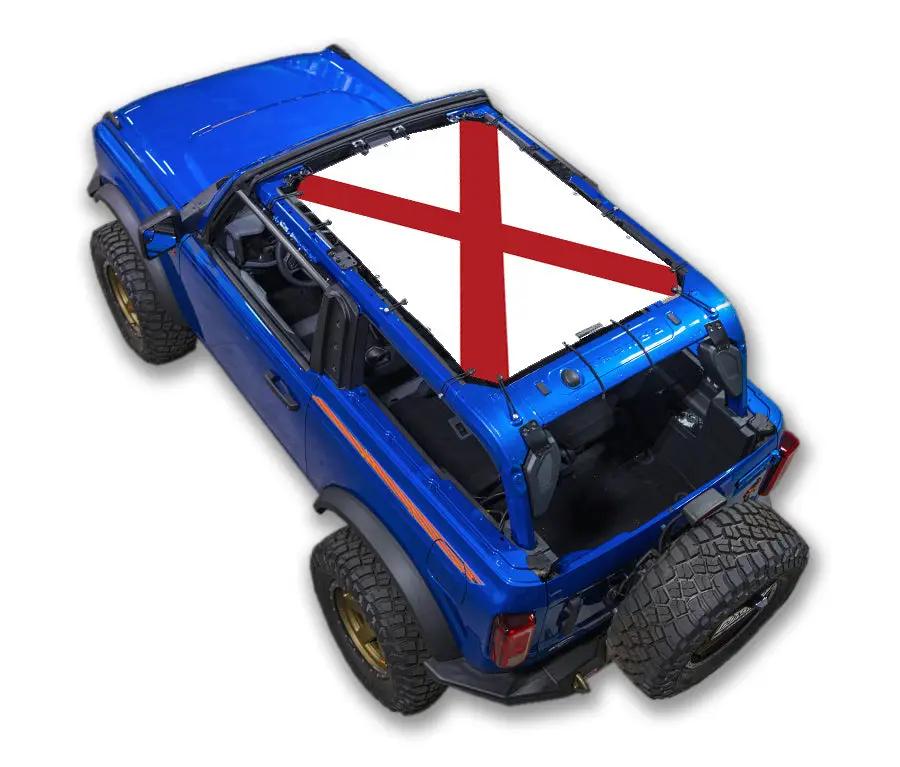 Sun shade top by SPIDERWEBSHADE for Ford Bronco (2021–2026); stock printed white cross-flag design on blue SUV