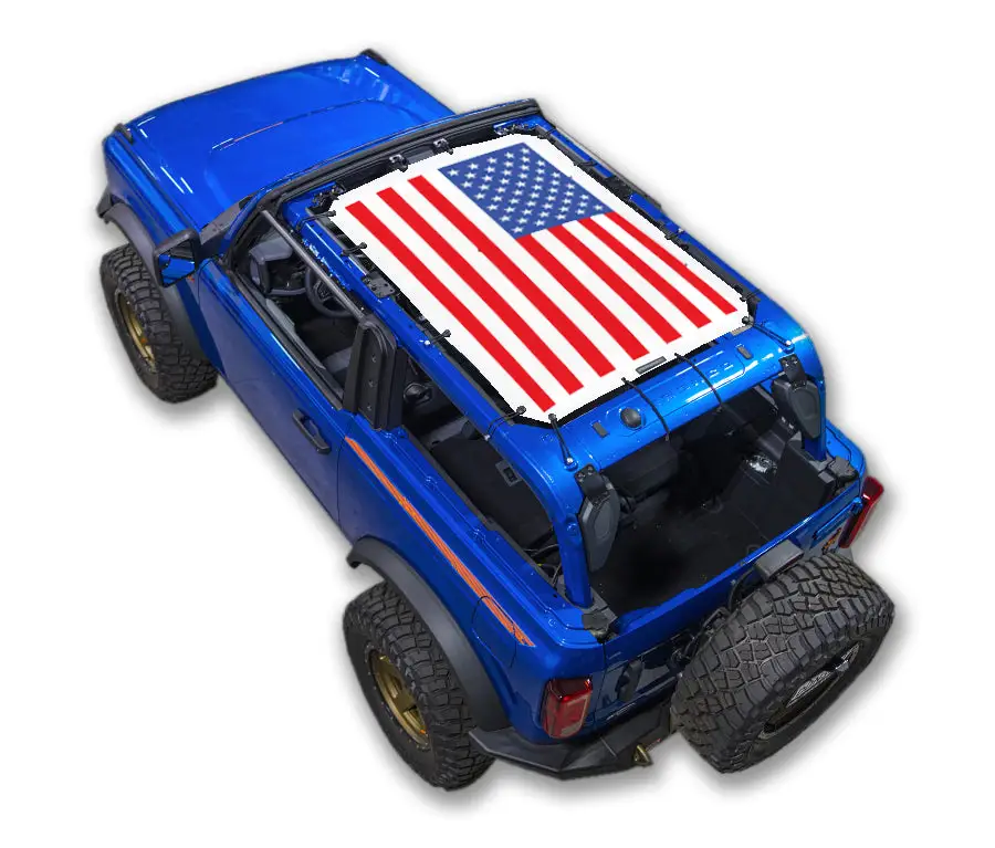 Sun shade for Ford Bronco (2021–2026) by SpiderWebShade with American flag printed top on blue SUV