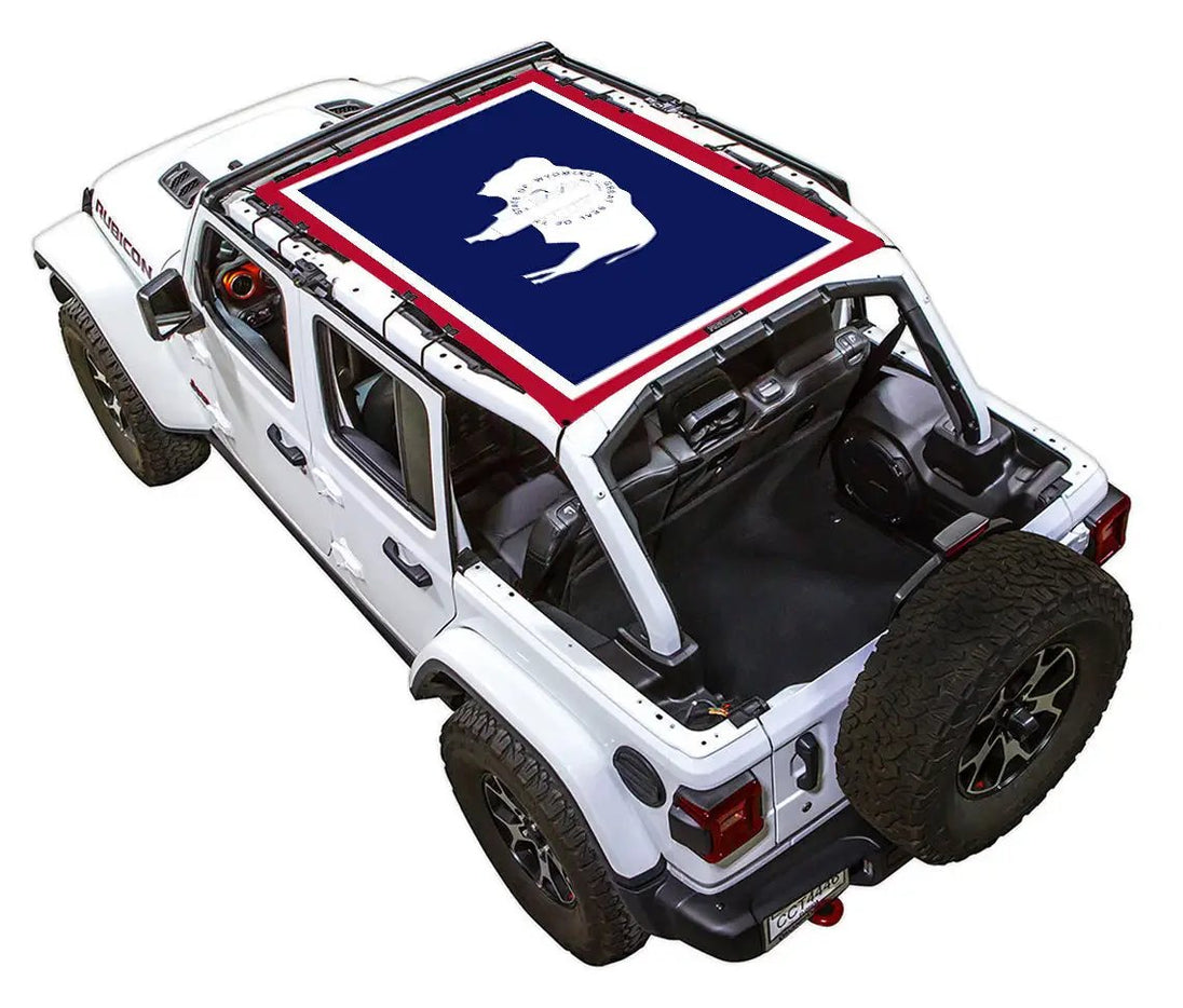Sun shade top for Jeep Wrangler JLU 4-Door by SpiderWebShade, printed blue with red border and white buffalo silhouette.