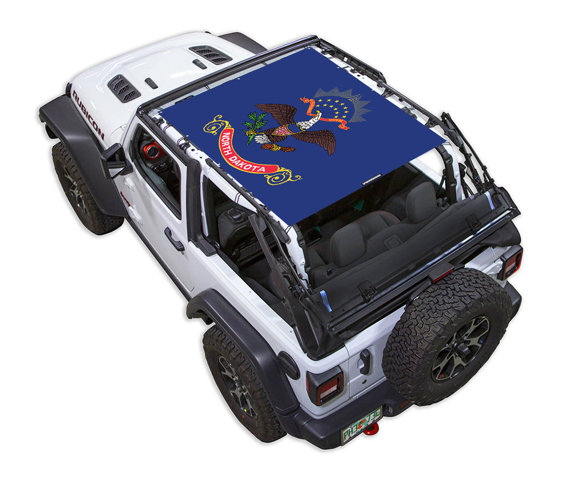 SpiderWebShade sun shade for Jeep Wrangler JL 2-Door with blue North Dakota flag print.