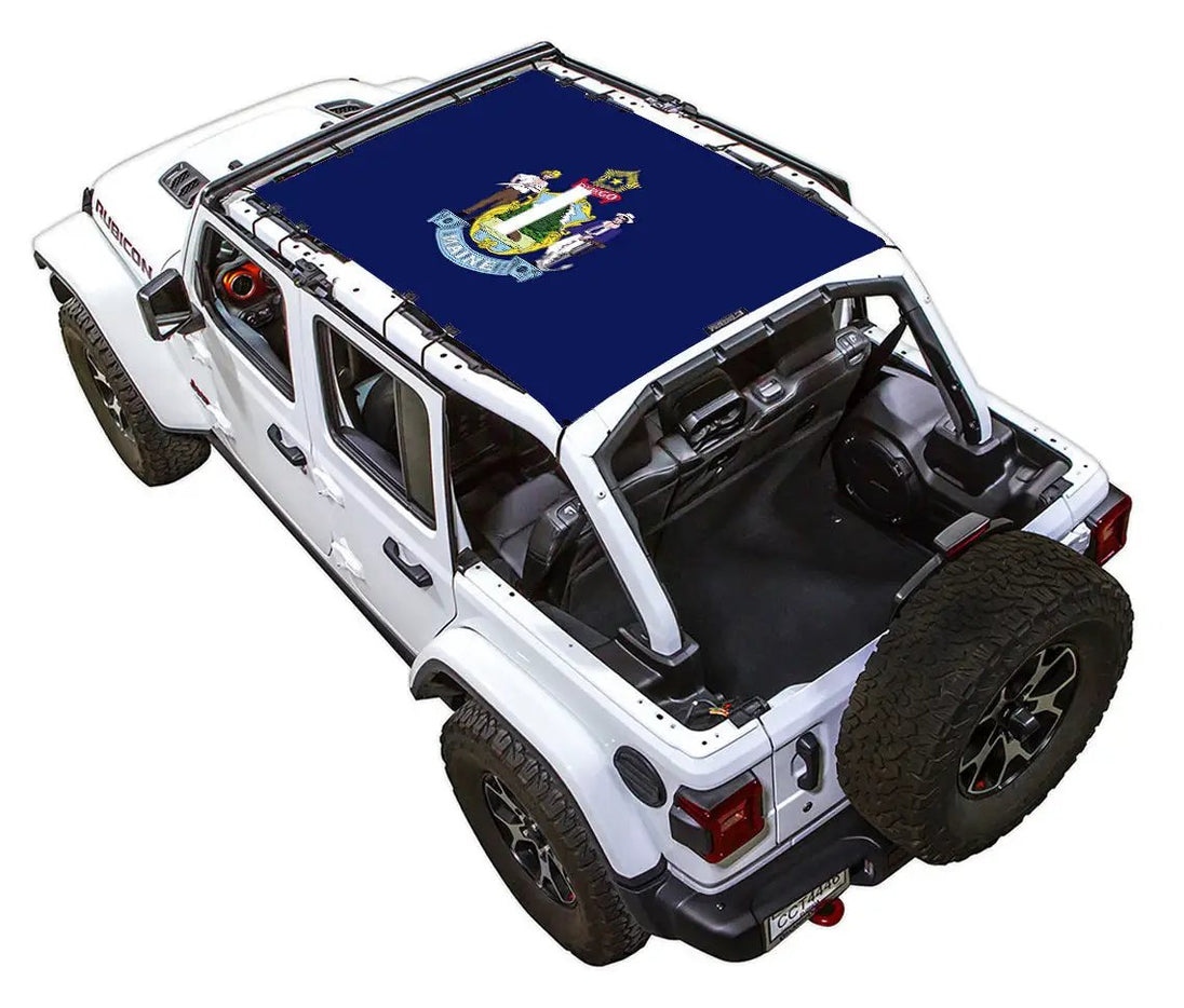 Sun shade by SPIDERWEBSHADE for Jeep Wrangler JLU 4-door; blue stock-printed roof with crest.