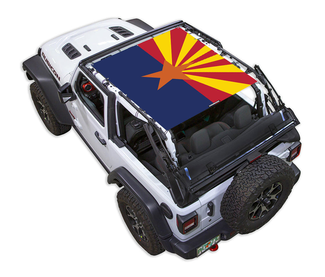SPIDERWEBSHADE sun shade for Jeep Wrangler JL 2-Door; stock printed top with Arizona flag-style sunburst design.