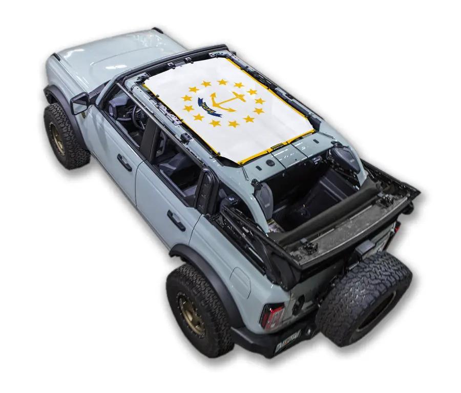 SpiderWebShade sun shade top for Ford Bronco (2021–2026); white printed shade with yellow star border and logo