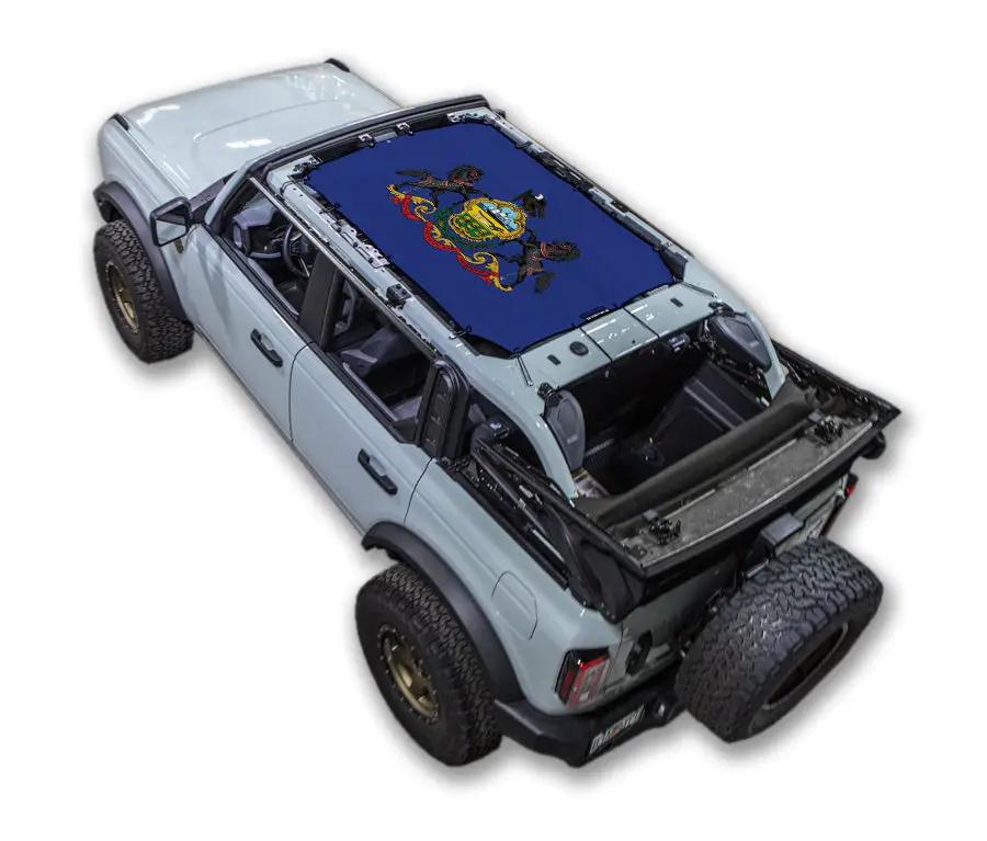 Ford Bronco Sun Shade Top by SPIDERWEBSHADE with blue printed graphic