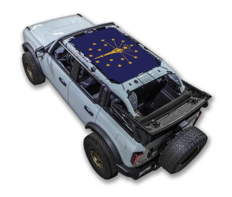 Sun Shade for Ford Bronco by SPIDERWEBSHADE in blue with star-torch print (2021–2026)