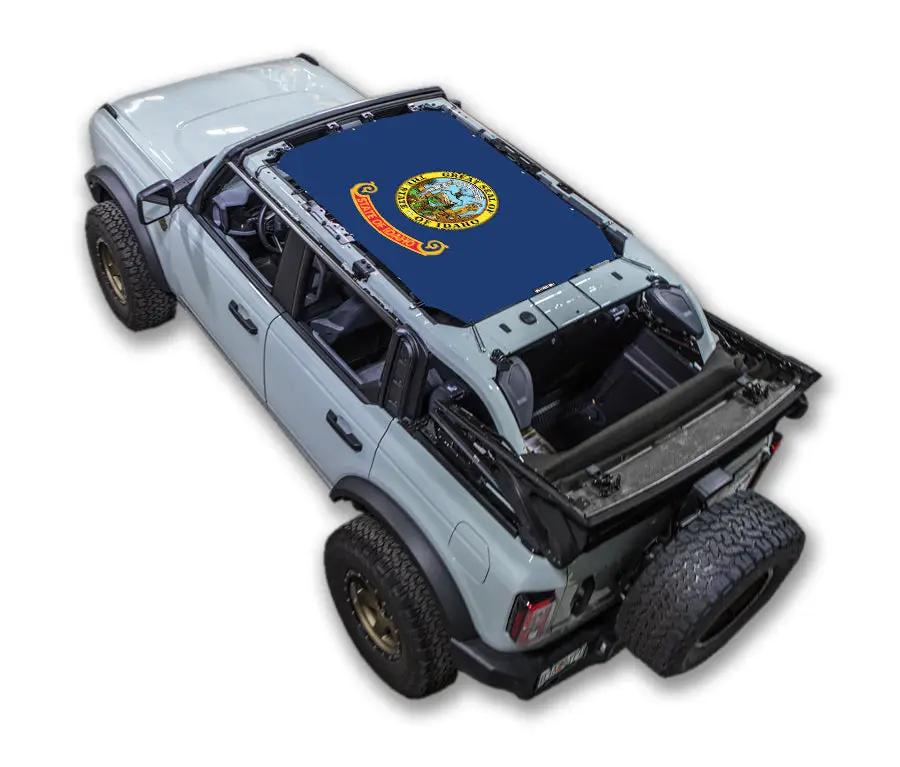 Sun shade for Ford Bronco (2021–2026) by SpiderWebShade; blue stock-printed top.