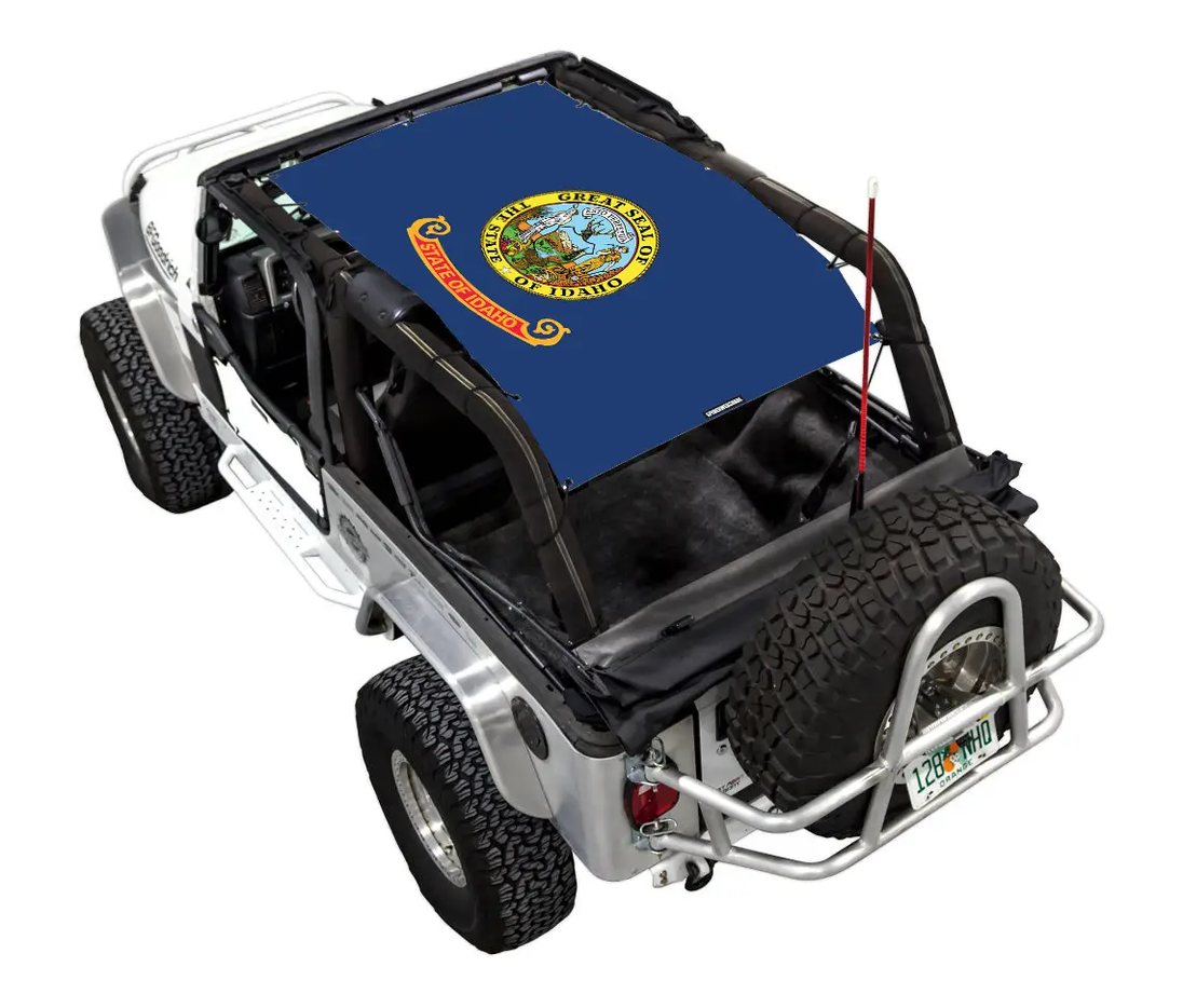 Sun Shade for Jeep Wrangler LJ (2004–2006) by SpiderWebShade; blue printed shade top with Idaho state flag.