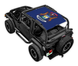 Sun shade top for Jeep Wrangler TJ by SPIDERWEBSHADE, blue printed crest design on a black Jeep