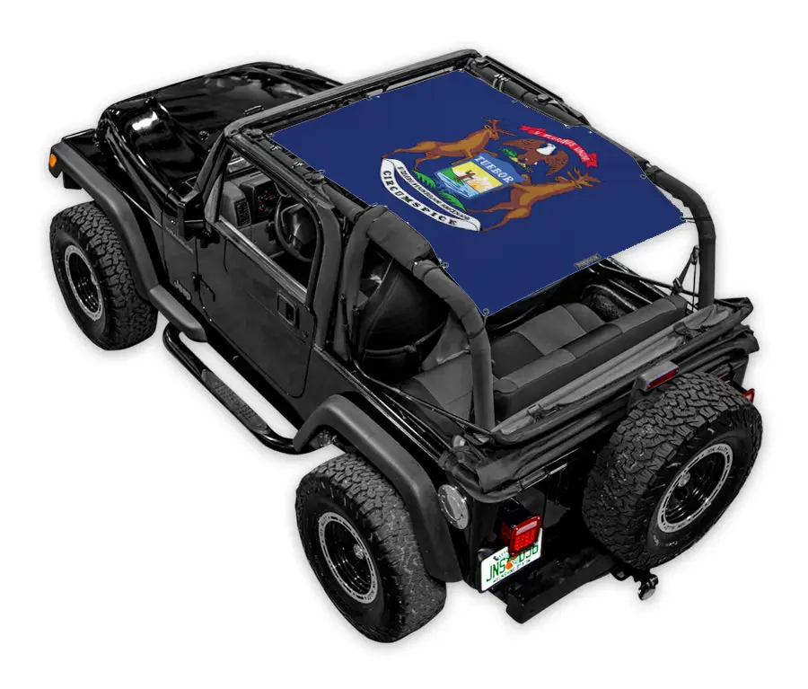 Sun shade top for Jeep Wrangler TJ by SPIDERWEBSHADE, blue printed crest design on a black Jeep