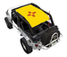 Sun shade SpiderWebShade for Jeep Wrangler LJ (2004–2006); bright yellow printed shade with red Zia sun symbol.